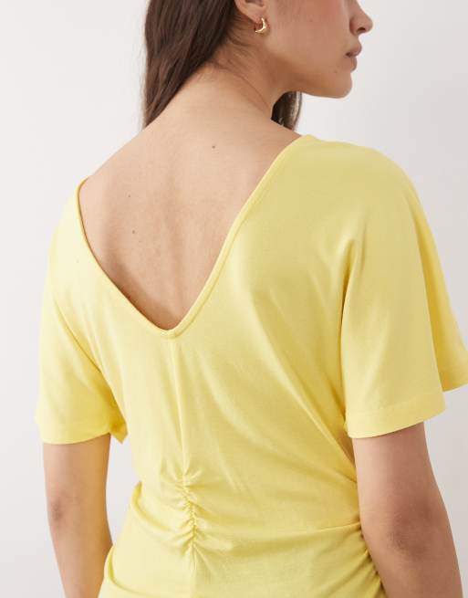 ASOS DESIGN cinch waist angel sleeve tee with v back detail in lemon, 2 of 4