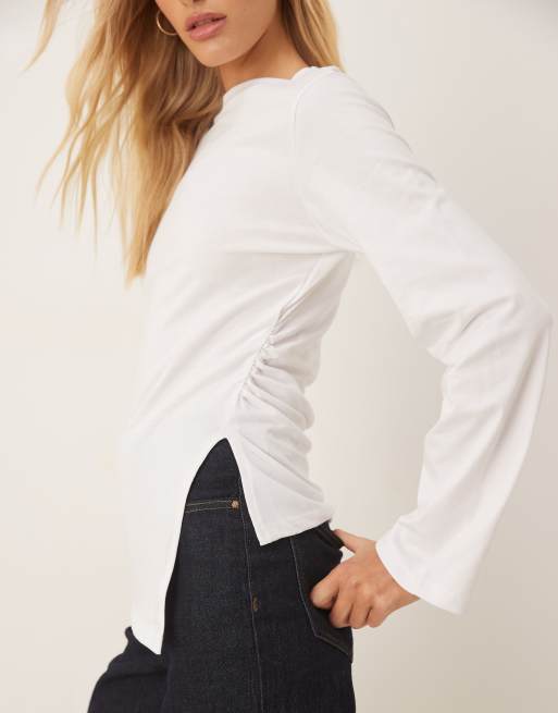 ASOS DESIGN cinched side asymmetric long sleeve top in white