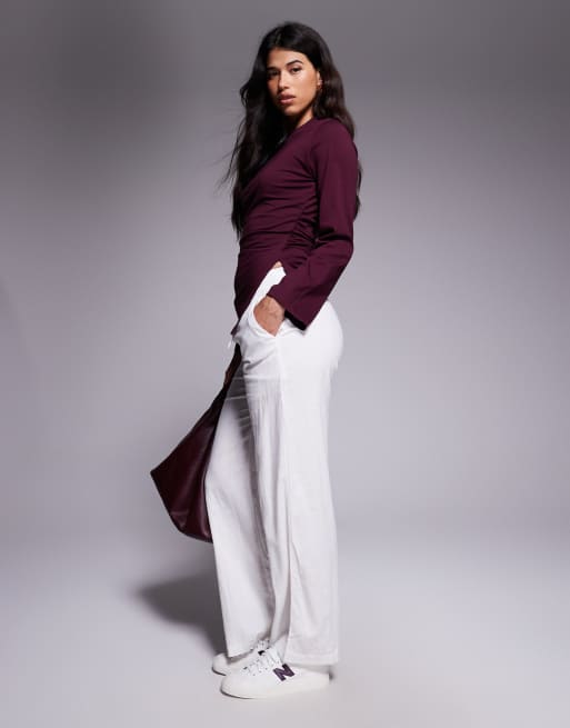 ASOS DESIGN cinched side asymmetric tee in wine