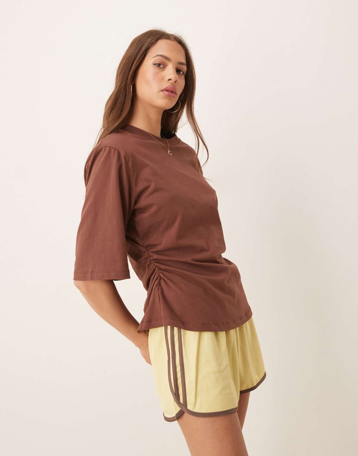 ASOS DESIGN cinched tee with shoulder pads in brown