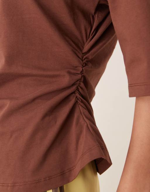 ASOS DESIGN cinched tee with shoulder pads in brown