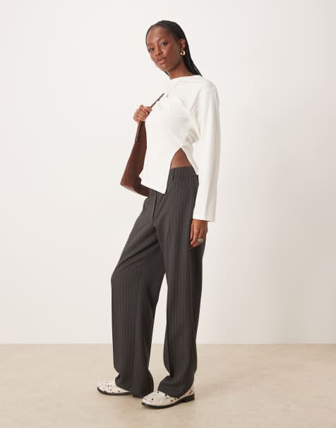 ASOS DESIGN cinched waist asymmetric hem long sleeve tee in cream - view 1