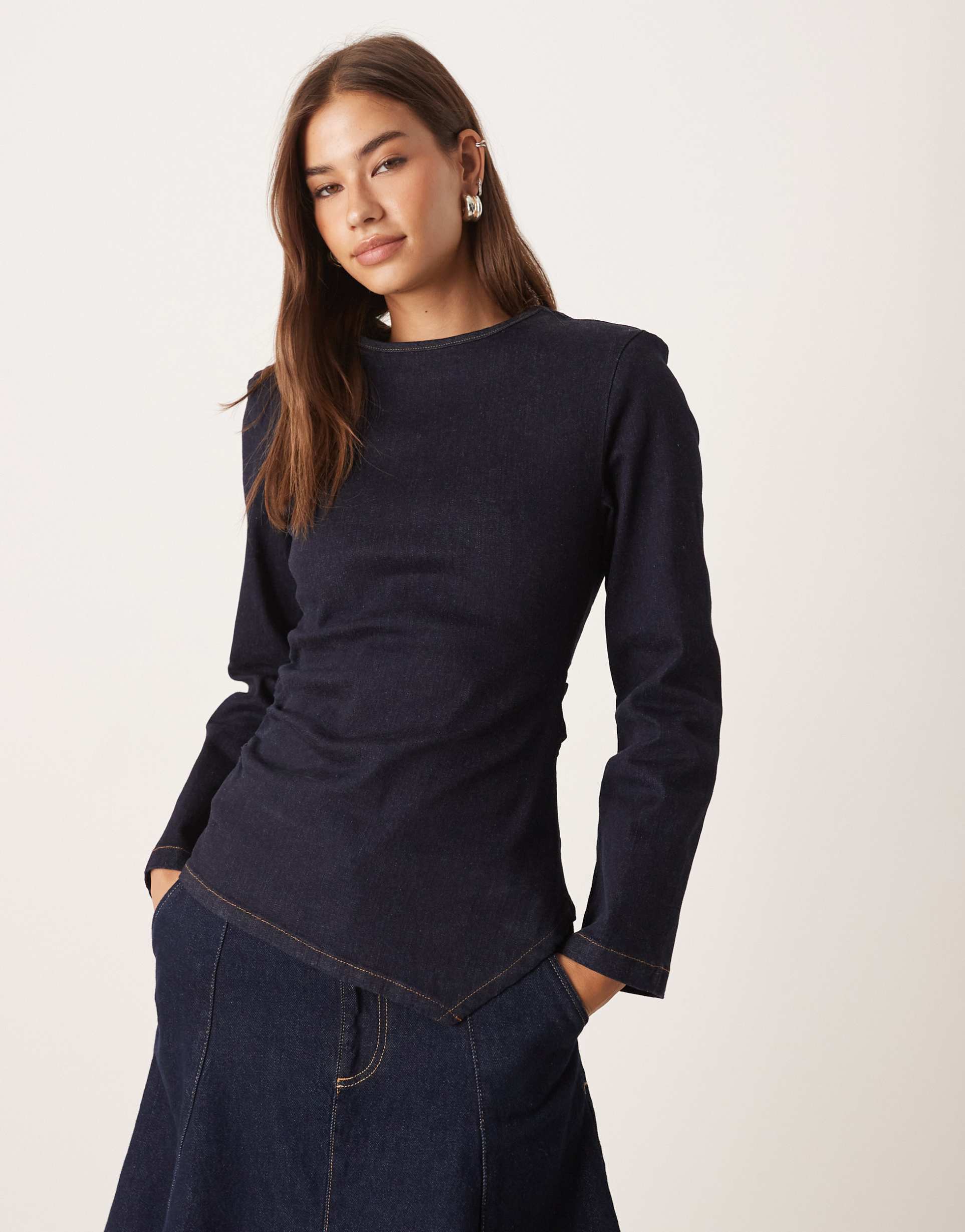 asos design cinched waist denim long sleeve top with shoulder pads in rinse wash