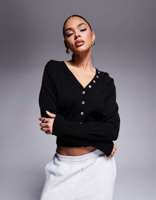 ASOS DESIGN cinched waist knit cardigan with faux shell buttons in black - view 1