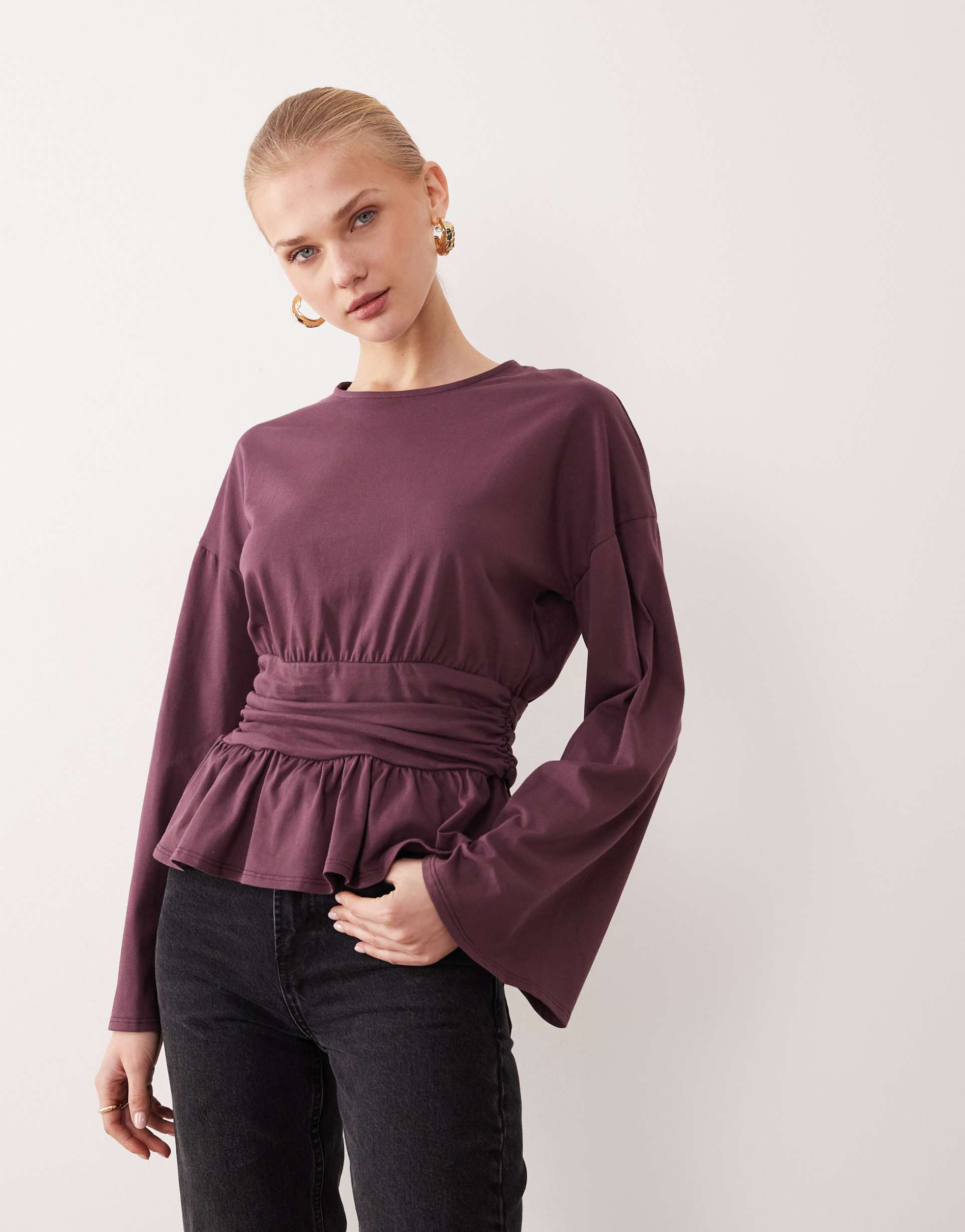 asos design cinched waist peplum hem long sleeve t-shirt in plum
