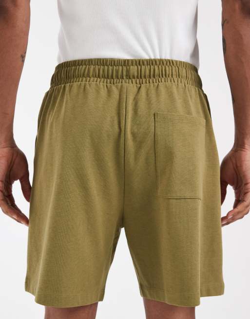 ASOS DESIGN Circular Design Collection - Pantalones cortos verdes extragrandes con pinzas de punto liso, 5 de 5