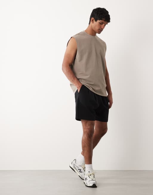 ASOS DESIGN circular pleated oversized jersey shorts in black, 2 of 5