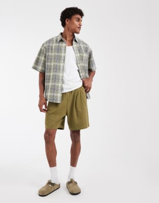 Asos Design Circular Pleated Oversized Jersey Shorts In Green