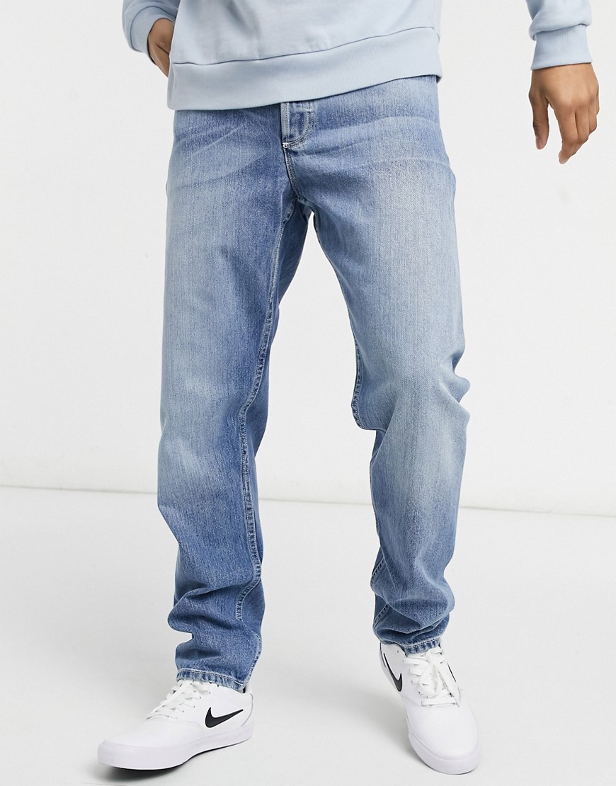 ASOS DESIGN Circular rigid slim jeans in light wash blue-Blues