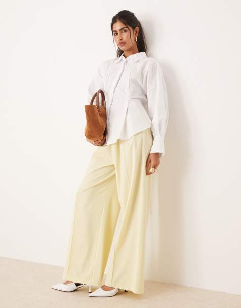 ASOS DESIGN – Citrongula, figursydda mjukisbyxor med passpoaler - view 1