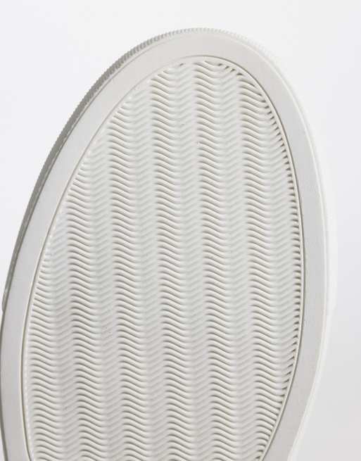 ASOS DESIGN classic lace up trainers in white with navy heel notch, 5 of 5