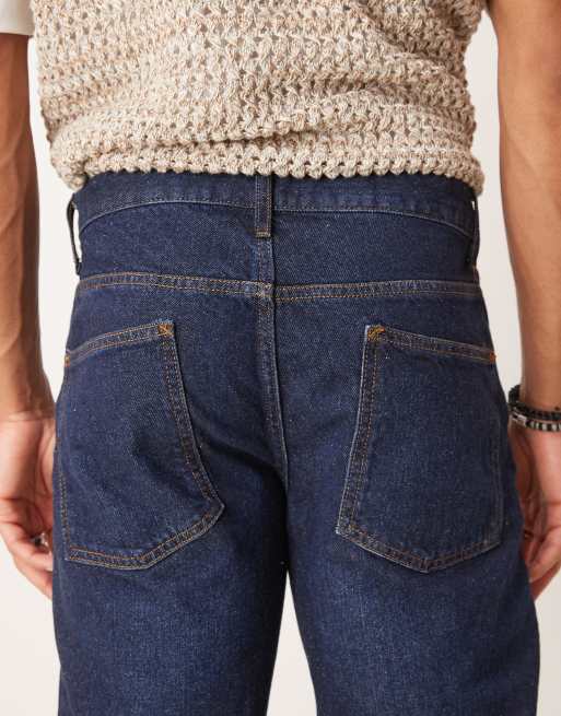 ASOS DESIGN tapered fit jean in dark wash blue