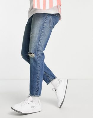 ASOS DESIGN classic rigid jean in tinted wash with knee rips