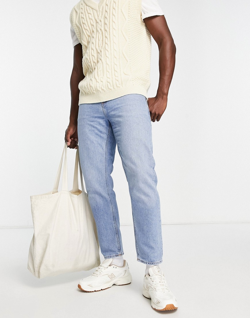 ASOS DESIGN classic rigid jeans in 'less thirsty' wash in light blue
