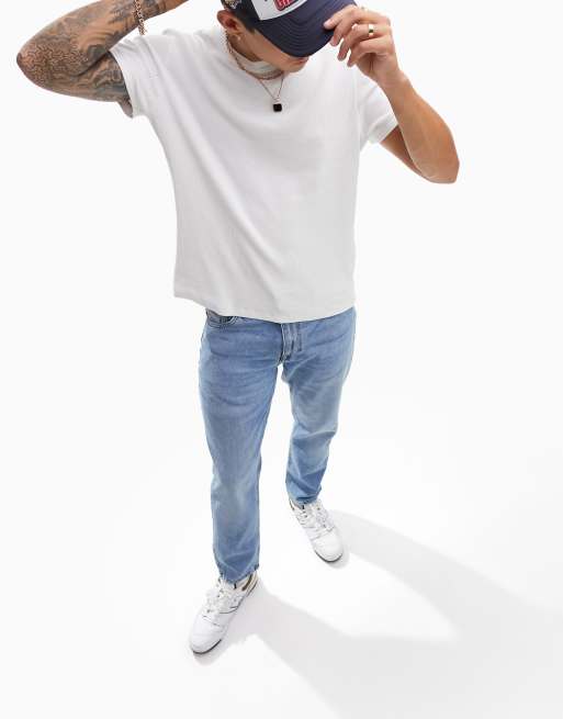 ASOS DESIGN classic rigid jeans in light wash blue 