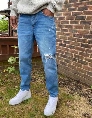 ASOS DESIGN classic rigid jeans in mid wash blue with rips ASOS