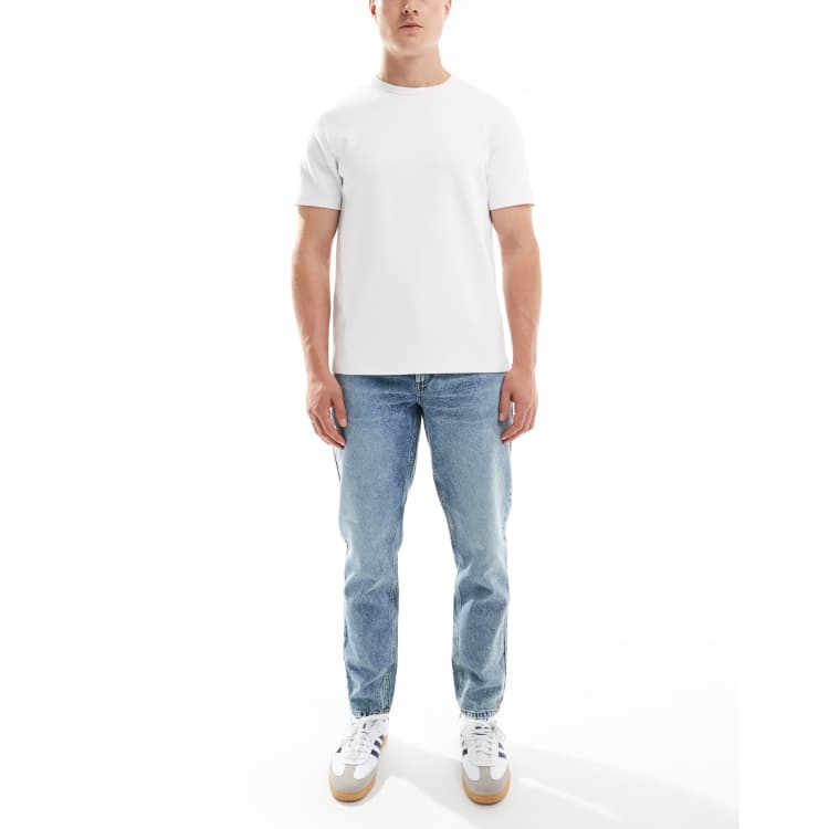 ASOS DESIGN classic rigid jeans in mid wash blue | ASOS