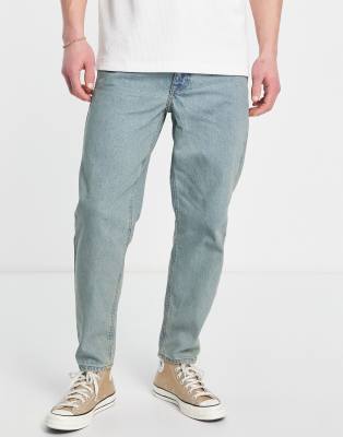 ASOS DESIGN classic rigid jeans in tinted light wash blue-Blues