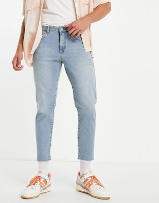 light wash raw hem jeans