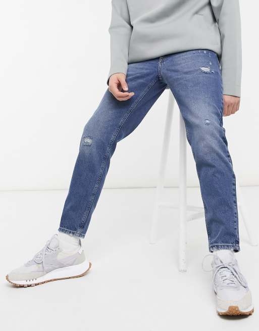 ASOS DESIGN classic rigid jeans in vintage mid wash with abrasions
