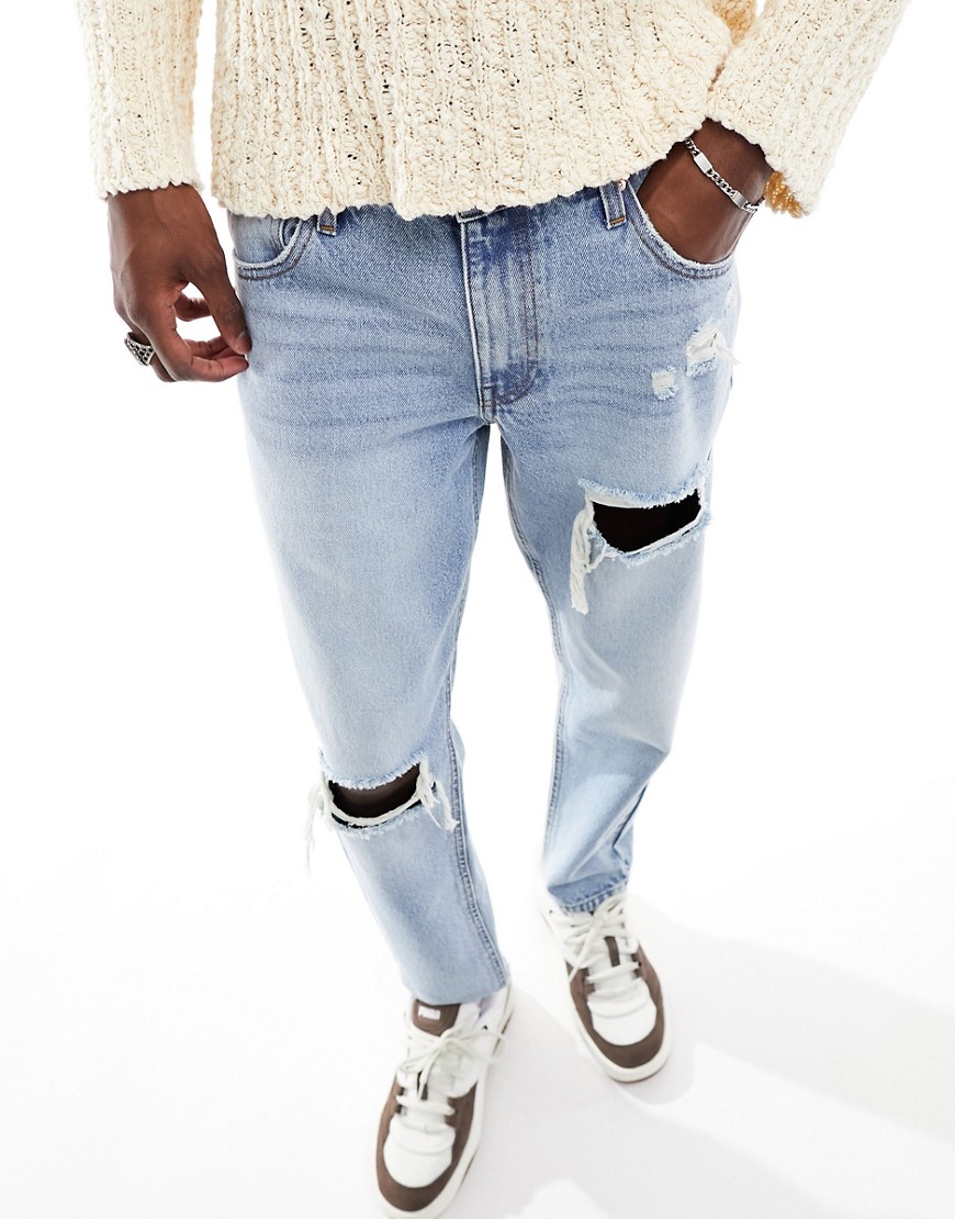 ASOS DESIGN classic rigid jeans with rips in light wash blue
