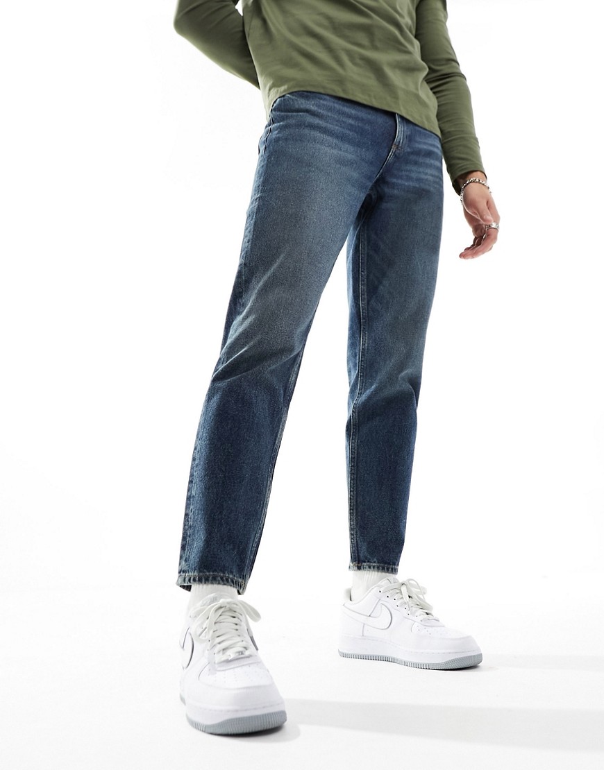 ASOS DESIGN classic rigid jeans with tinted dark wash-Blue
