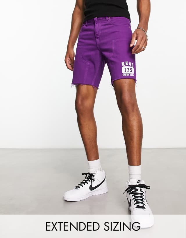 ASOS DESIGN classic rigid shorts in purple with varsity print