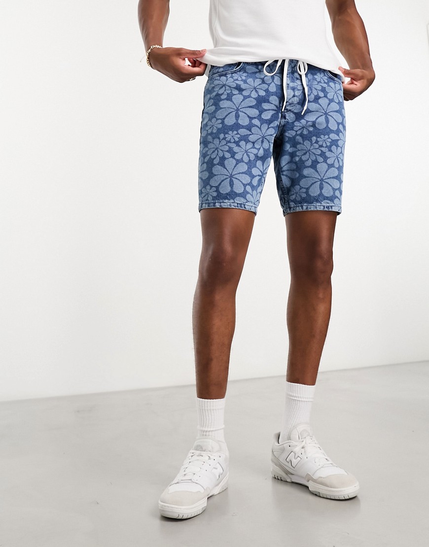 ASOS DESIGN classis rigid regular length denim shorts with flower print in mid wash blue