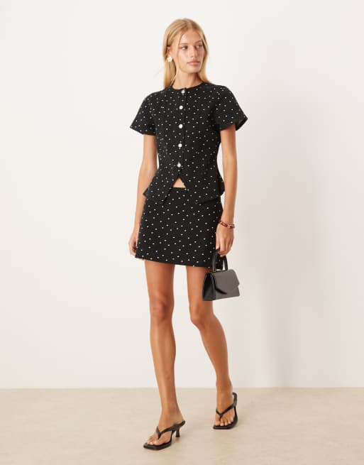 ASOS DESIGN clean denim micro skirt in mini polka dots