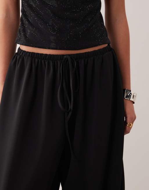 ASOS DESIGN clean jersey twill tie waist balloon pants in black, 5 of 5