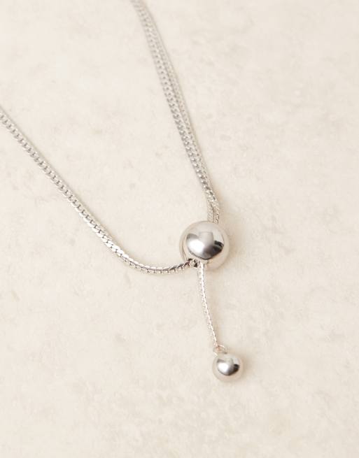 ASOS DESIGN clean lariat necklace with spherical ball detail in silver tone, 2 of 3