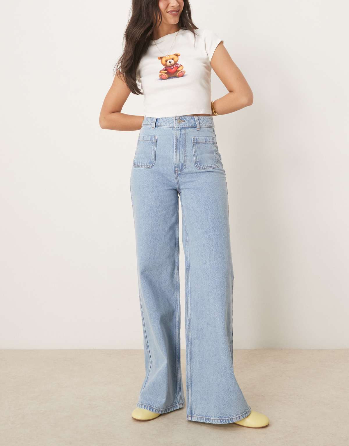 ASOS DESIGN clean wide leg jeans with front pockets in light blue