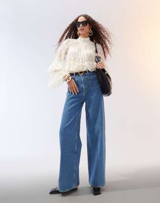 clean wide leg jeans with front pockets in mid blue