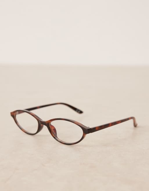 ASOS DESIGN clear blue light lens slim oval glasses in tort, 2 of 3