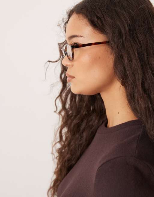 ASOS DESIGN clear blue light lens slim oval glasses in tort, 3 of 3
