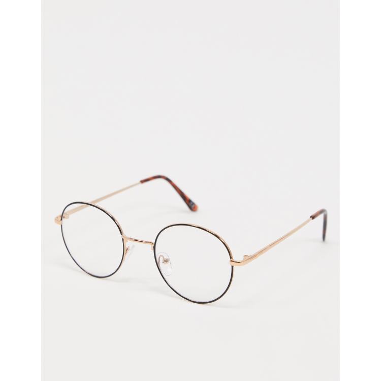 ASOS DESIGN clear lens black round glasses with gold nose bridge