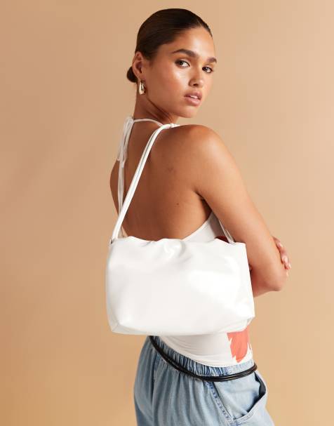 ASOS DESIGN - Cloud - Schoudertas met textuur en geknoopt hengsel in hoogglanzend wit - view 1