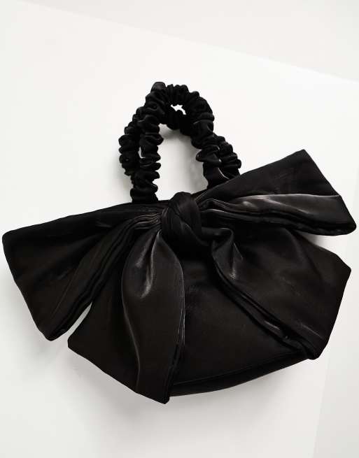 ASOS DESIGN Clutch Tasche in Schwarz mit Oversize Schleife und Tragegriff