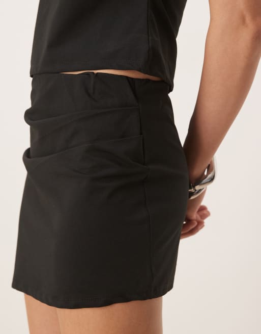 ASOS DESIGN co-ord asymmetric hem mini skirt with pleat detail in black, 2 of 5