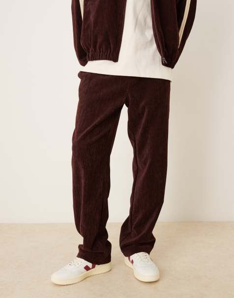 ASOS DESIGN co-ord baggy pull on trousers in burgundy with side taping - view 1
