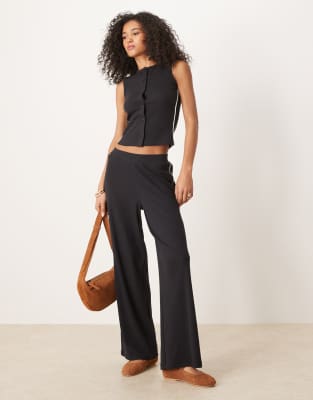 ASOS DESIGN co-ord crew neck top and wide leg trouser with contrast piping in black - view 1