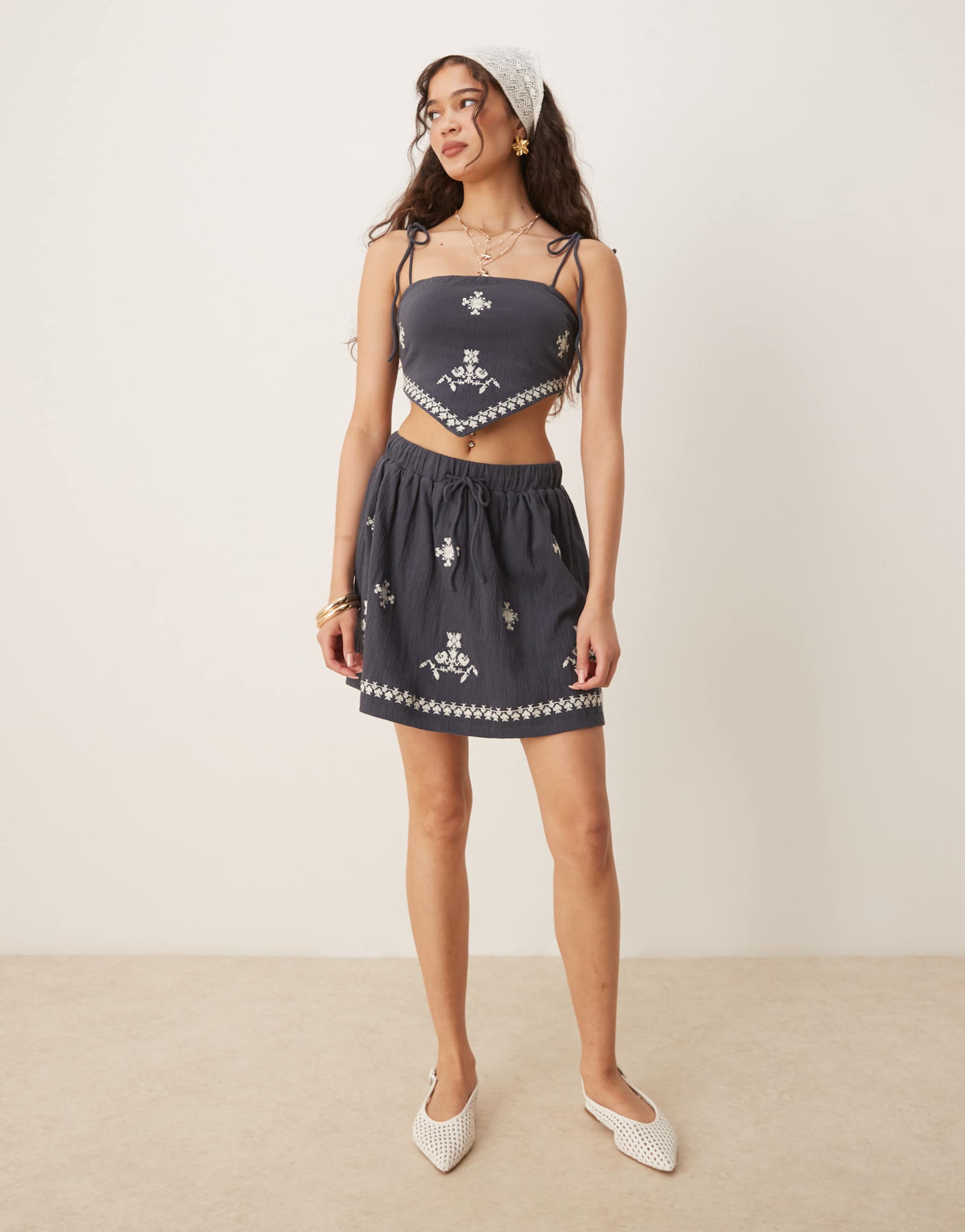 ASOS DESIGN co-ord crinkle embroidered mini skirt in washed navy
