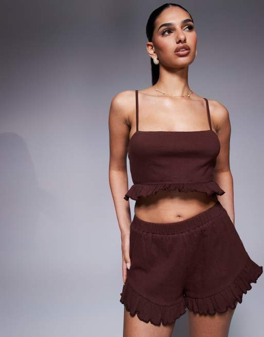 ASOS DESIGN co-ord crinkle flippy shorts with frill hem in brown - BROWN