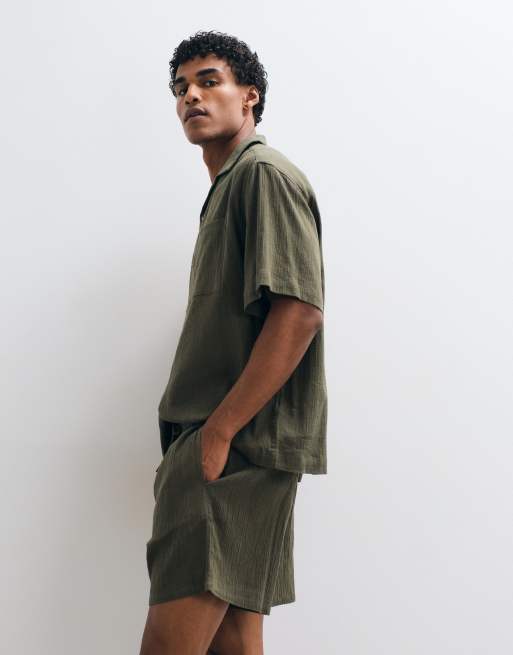 ASOS DESIGN co-ord crinkle texture shorts in mid length in dark green, 5 of 5