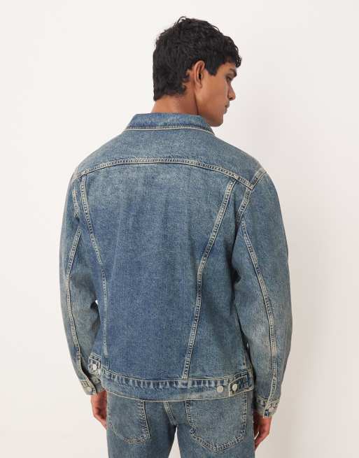 ASOS DESIGN co-ord denim trucker jacket in mid wash blue with yellow tint, 3 of 5