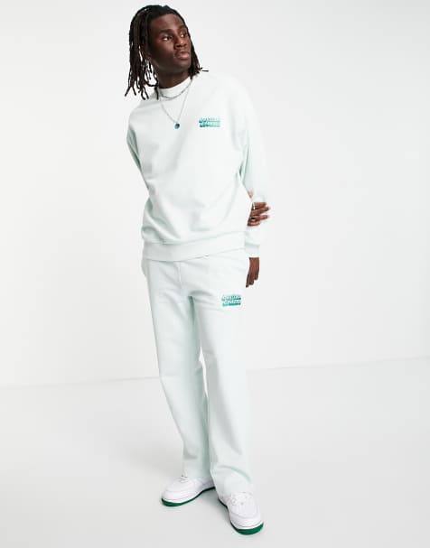 ASOS DESIGN co-ord flare joggers with small text print - view 1