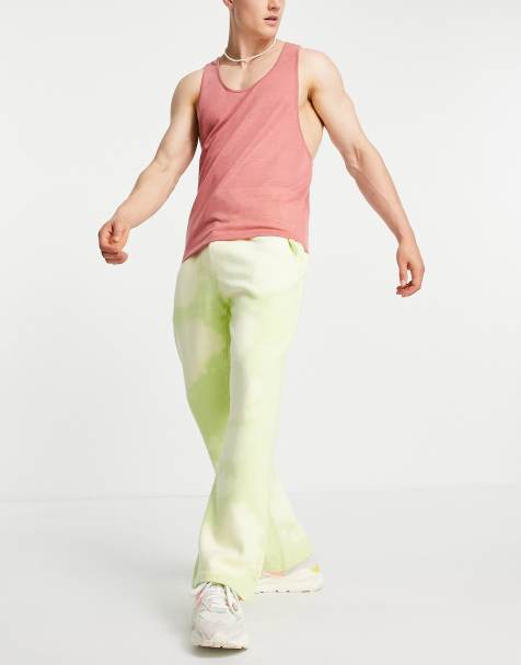 ASOS DESIGN co-ord jersey flared joggers in green tie dye