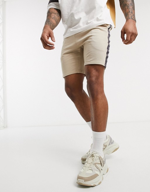 ASOS DESIGN co-ord jersey skinny shorts in beige with geometric taping