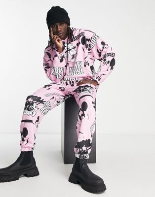ASOS DESIGN Punk Mickey co-ord jogger with Disney all over prints in pink