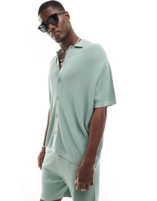 ASOS DESIGN co-ord knitted button through polo in green twisted rib